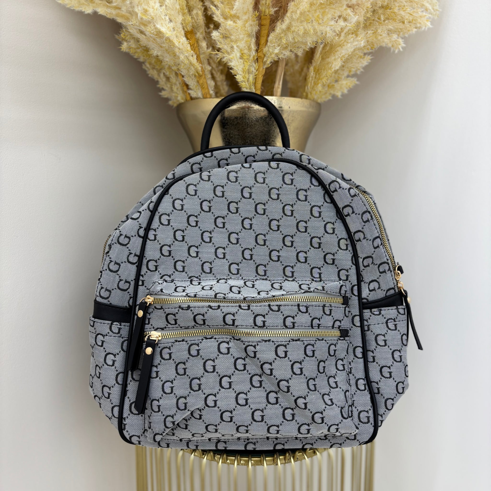 G Backpack with Gold Detailing