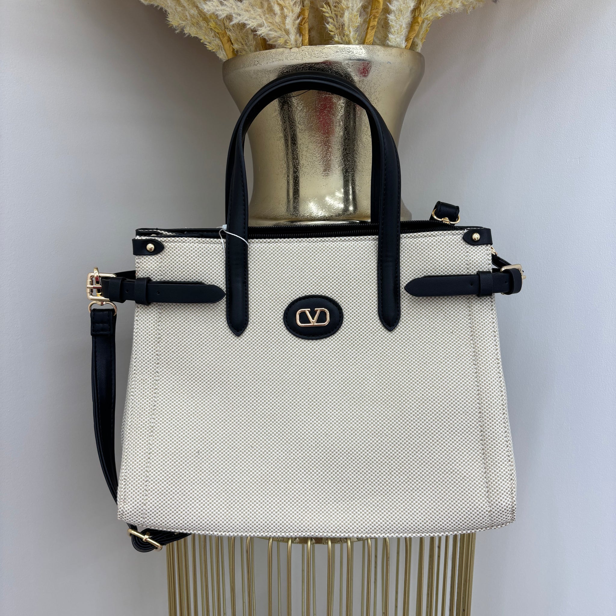 V Woven gold detail handbag