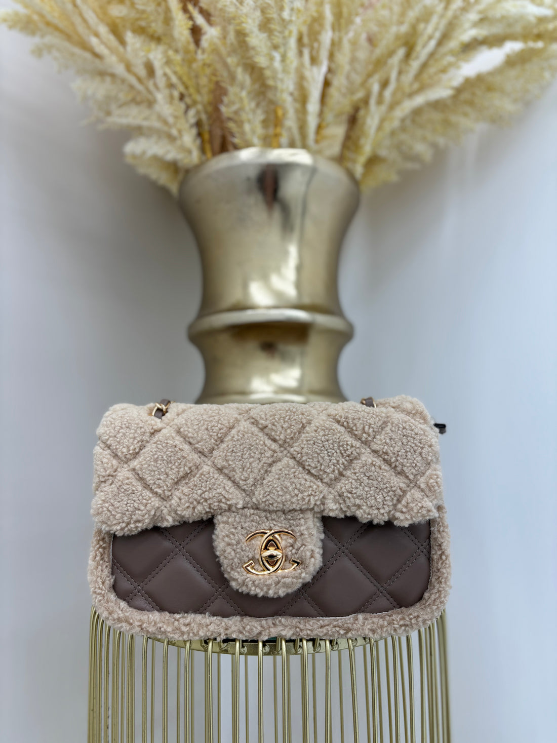 CC teddy quilted shoulder bag with gold hardware