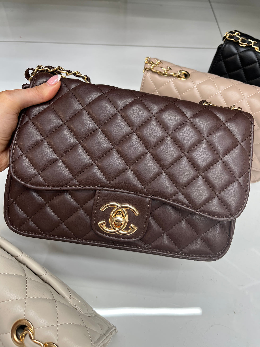 C C inspo quilted chain bag